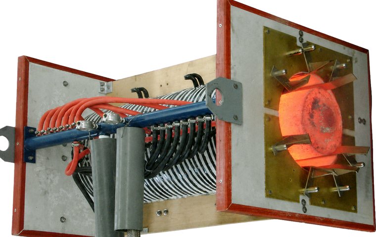Open-style induction coil with a billet at temperature